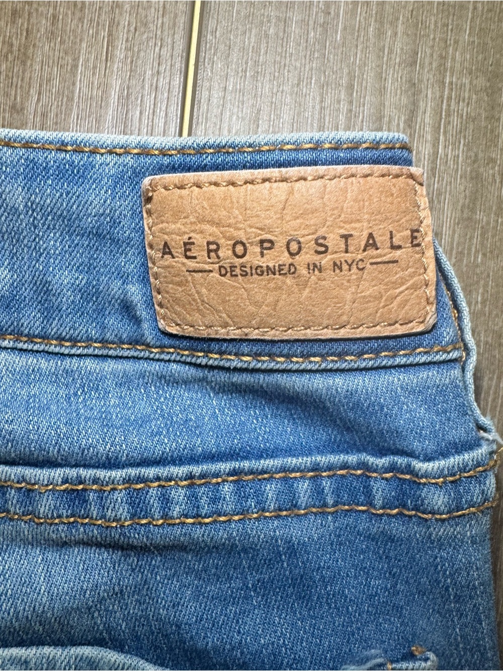 Aeropostale Blue Skinny Jeans with Tan Leather Patch